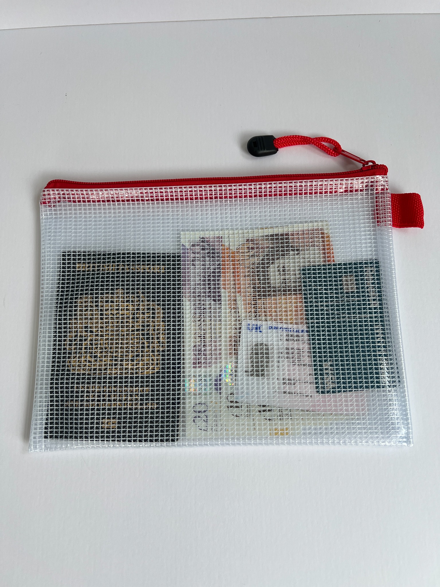 Document pouch packed with example emergency documents