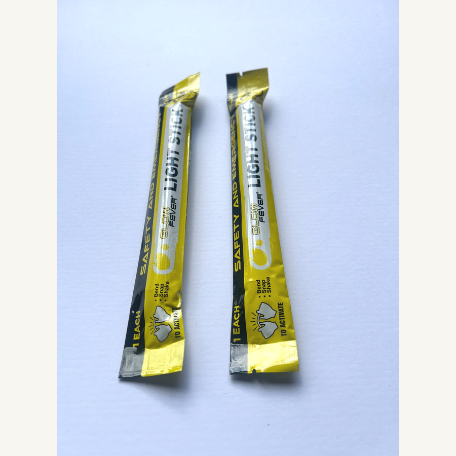 Two yellow emergency glow sticks